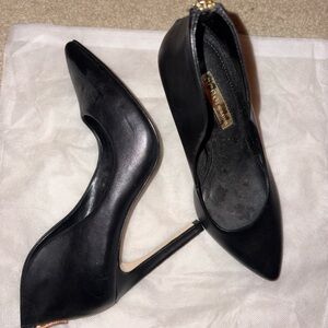 BCBG Sleek Black gold zipper Stiletto Heels